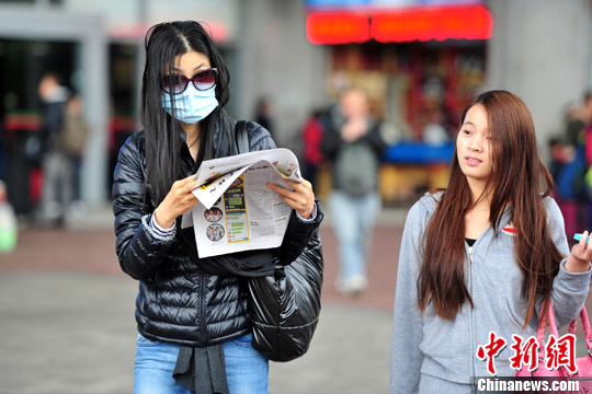 深港防控禽流感H7N9疫情 部分游客戴口罩(圖)