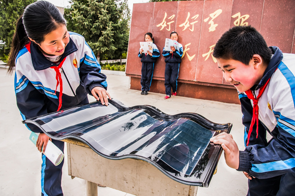 尖端高科技為建筑賦能 中國日報-漢能“陽光之旅”國際攝影師體驗計劃落幕