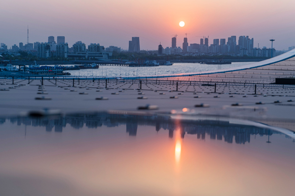 尖端高科技為建筑賦能 中國日報-漢能“陽光之旅”國際攝影師體驗計劃落幕